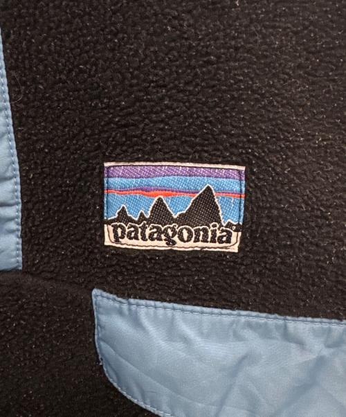 Patagonia（パタゴニア）Patagonia (パタゴニア) URBAN OUTFITTERS (アーバンアウトフィッターズ) シンチラスナップT ブラック×ブルー サイズ:Sの古着・服飾アイテム