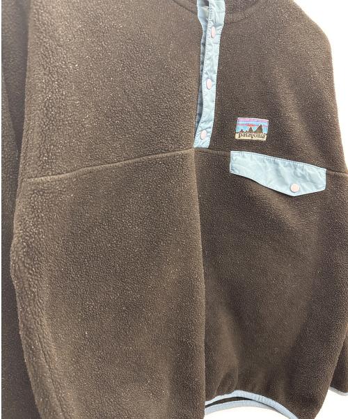 Patagonia（パタゴニア）Patagonia (パタゴニア) URBAN OUTFITTERS (アーバンアウトフィッターズ) シンチラスナップT ブラック×ブルー サイズ:Sの古着・服飾アイテム