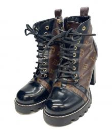 LOUIS VUITTON（ルイ ヴィトン）の古着「スタートレイル アンクルブーツ」｜ブラック×ブラウン