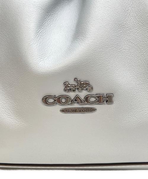 COACH（コーチ）COACH (コーチ) フェイ ドローストリング バッグ スカイブルーの古着・服飾アイテム