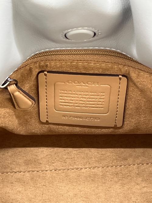 COACH（コーチ）COACH (コーチ) フェイ ドローストリング バッグ スカイブルーの古着・服飾アイテム