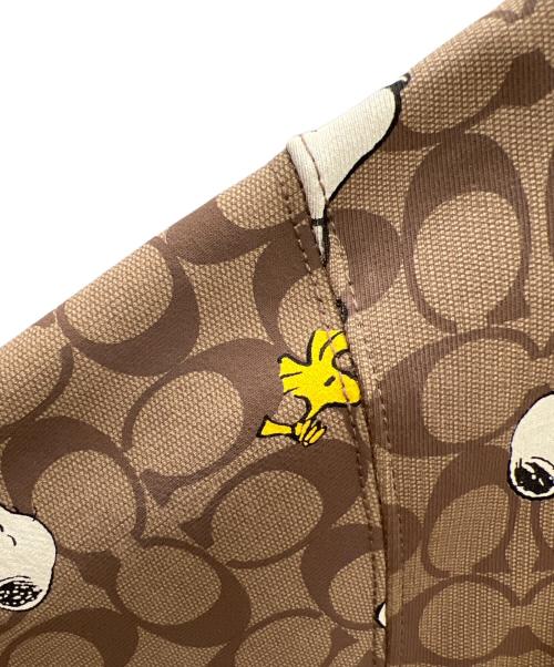 COACH（コーチ）COACH (コーチ) SNOOPY (スヌーピー) プルオーバーパーカー ブラウン サイズ:Mの古着・服飾アイテム