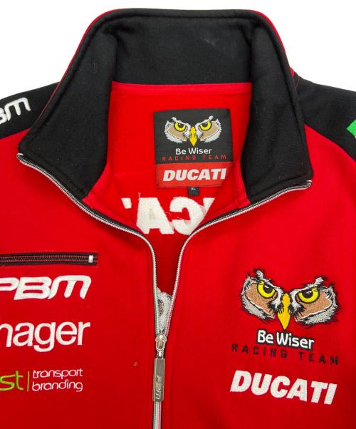 Be Wiser Racing Team（ビー・ワイザー・レーシング・チーム）Be Wiser Racing Team (ビー・ワイザー・レーシング・チーム) DUCATI (ドゥカティ) トラックジャケット レッド サイズ:XLの古着・服飾アイテム