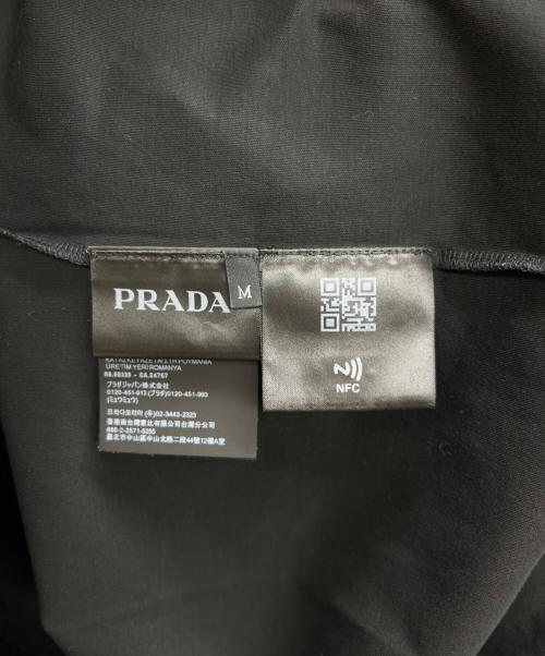 PRADA（プラダ）PRADA (プラダ) トライアングルロゴ プリント コットン Tシャツ ブラック サイズ:Ｍの古着・服飾アイテム