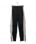 Maison MIHARA YASUHIRO（メゾン ミハラ ヤスヒロ）の古着「ライントラックパンツ」｜ブラック×ホワイト