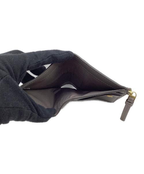 TORY BURCH（トリーバーチ）TORY BURCH (トリーバーチ) 2つ折り財布　TORY BURCH ブラウンの古着・服飾アイテム