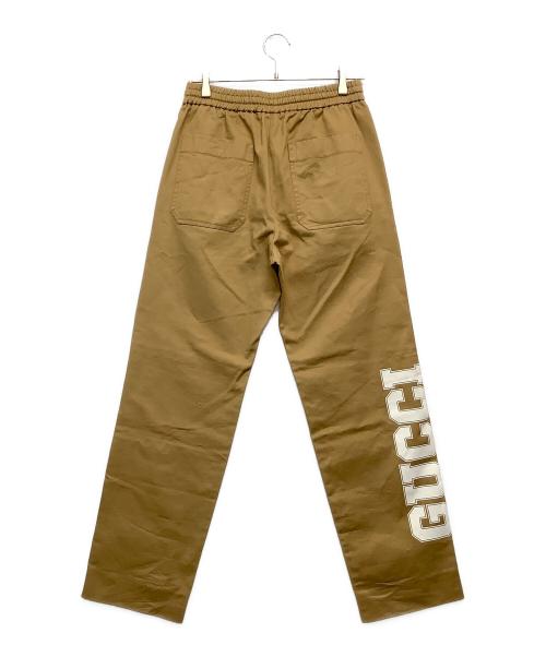 GUCCI（グッチ）GUCCI (グッチ) ロゴプリントドローストリングパンツ ベージュ サイズ:44の古着・服飾アイテム