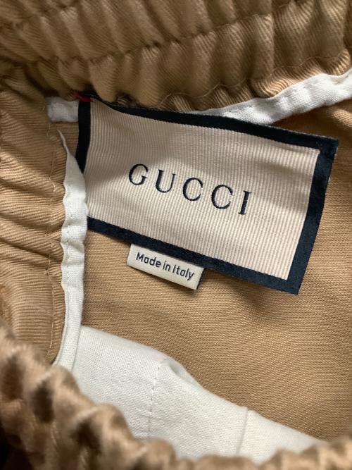 GUCCI（グッチ）GUCCI (グッチ) ロゴプリントドローストリングパンツ ベージュ サイズ:44の古着・服飾アイテム