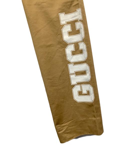 GUCCI（グッチ）GUCCI (グッチ) ロゴプリントドローストリングパンツ ベージュ サイズ:44の古着・服飾アイテム