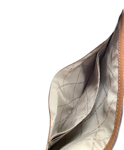 MICHAEL KORS（マイケル・コース）MICHAEL KORS (マイケルコース) クラッチバッグ ブラウンの古着・服飾アイテム