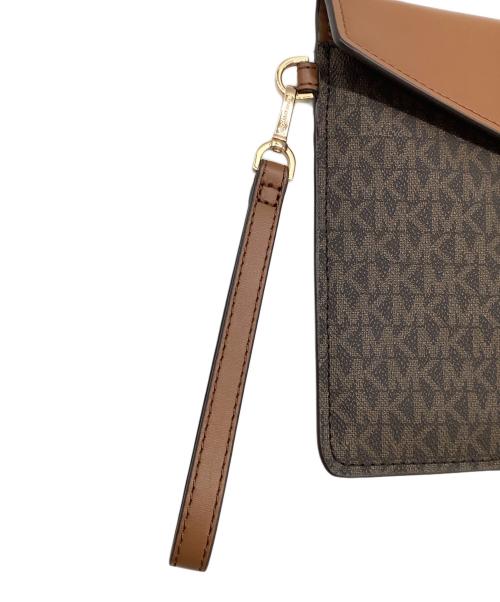 MICHAEL KORS（マイケル・コース）MICHAEL KORS (マイケルコース) クラッチバッグ ブラウンの古着・服飾アイテム