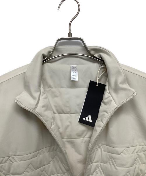 adidas（アディダス）adidas (アディダス) 中綿ジャケット ベージュ サイズ: L 未使用品の古着・服飾アイテム