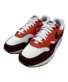 NIKE（ナイキ）の古着「ローカットスニーカー」｜ブラウン×オレンジ