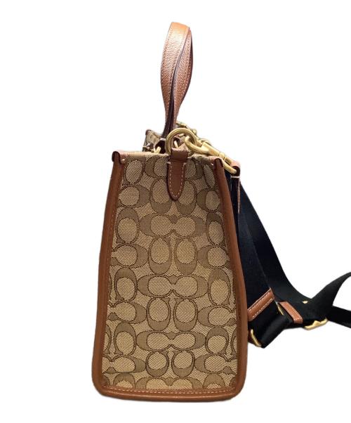 COACH（コーチ）COACH (コーチ) DISNEY (ディズニー) 2WAYキャンバストートバッグ ブラウンの古着・服飾アイテム