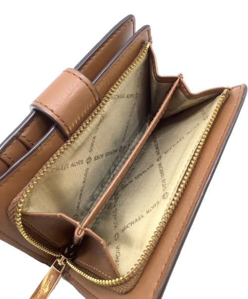 MICHAEL KORS（マイケルコース）MICHAEL KORS (マイケルコース) 2つ折り財布 アイボリーの古着・服飾アイテム