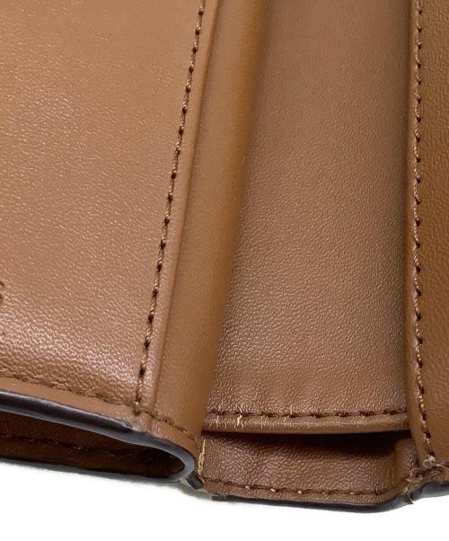 MICHAEL KORS（マイケルコース）MICHAEL KORS (マイケルコース) 2つ折り財布 アイボリーの古着・服飾アイテム