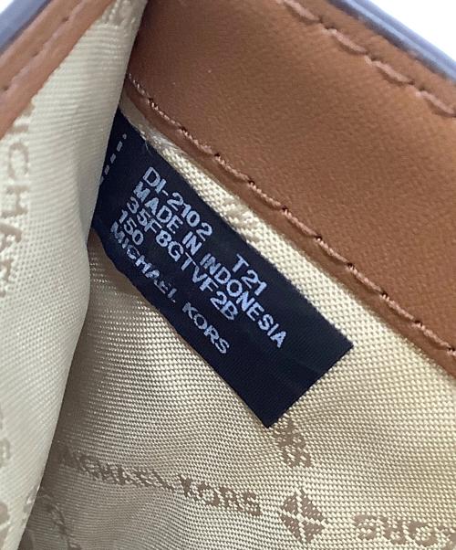 MICHAEL KORS（マイケルコース）MICHAEL KORS (マイケルコース) 2つ折り財布 アイボリーの古着・服飾アイテム