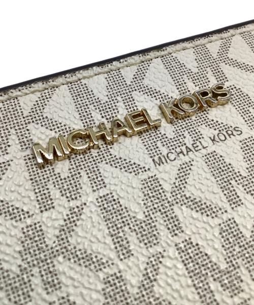 MICHAEL KORS（マイケルコース）MICHAEL KORS (マイケルコース) 2つ折り財布 アイボリーの古着・服飾アイテム