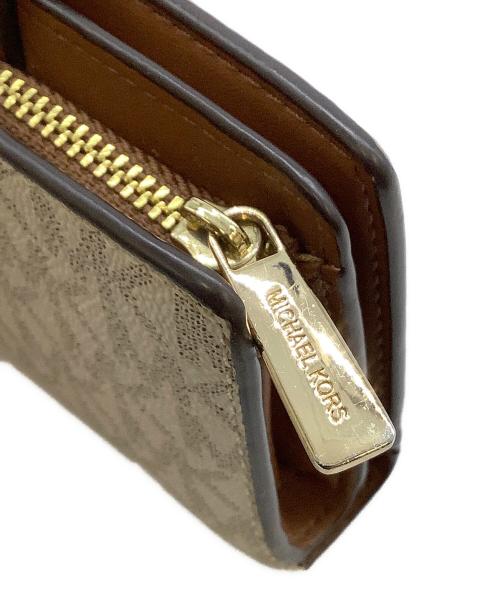 MICHAEL KORS（マイケルコース）MICHAEL KORS (マイケルコース) 2つ折り財布 アイボリーの古着・服飾アイテム
