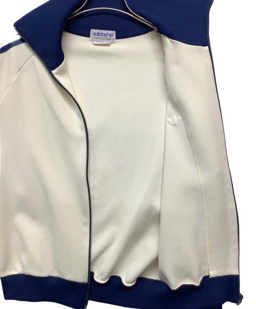 adidas（アディダス）adidas (アディダス) トラックジャケット　アディダス　デサント アイボリー×ブルー サイズ:3号の古着・服飾アイテム