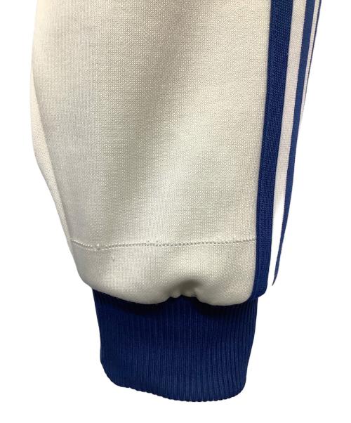 adidas（アディダス）adidas (アディダス) トラックジャケット　アディダス　デサント アイボリー×ブルー サイズ:3号の古着・服飾アイテム