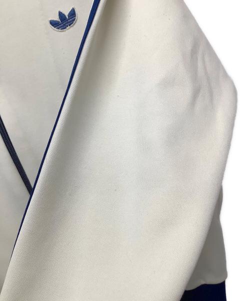 adidas（アディダス）adidas (アディダス) トラックジャケット　アディダス　デサント アイボリー×ブルー サイズ:3号の古着・服飾アイテム