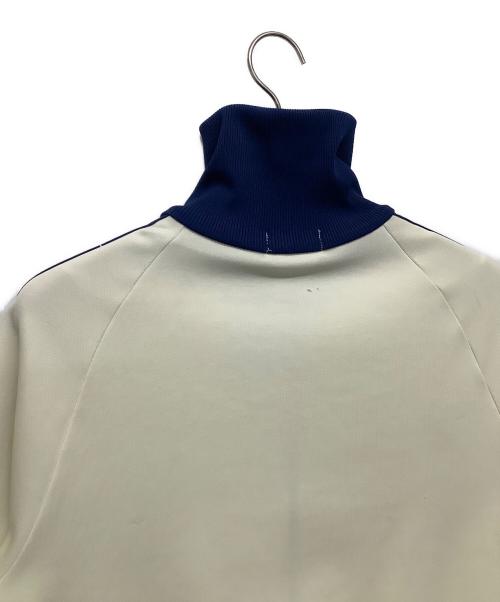 adidas（アディダス）adidas (アディダス) トラックジャケット　アディダス　デサント アイボリー×ブルー サイズ:3号の古着・服飾アイテム