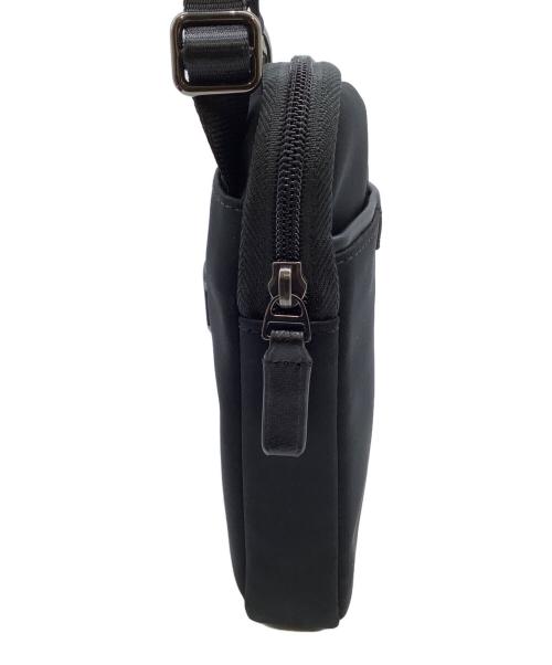 TUMI（トゥミ）TUMI (トゥミ) スモール・クロス・ボディ・ポーチ ブラックの古着・服飾アイテム