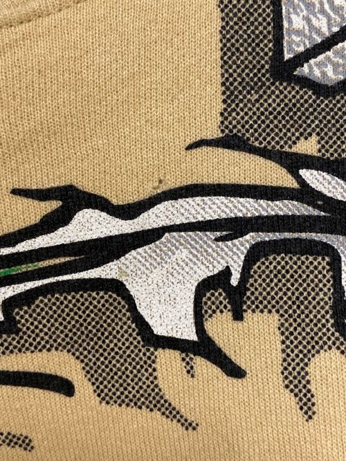 LOONEY TUNES（ルーニーチューンズ）LOONEY TUNES (ルーニーチューンズ) プリントクルーネックスウェット アイボリー サイズ:Mの古着・服飾アイテム