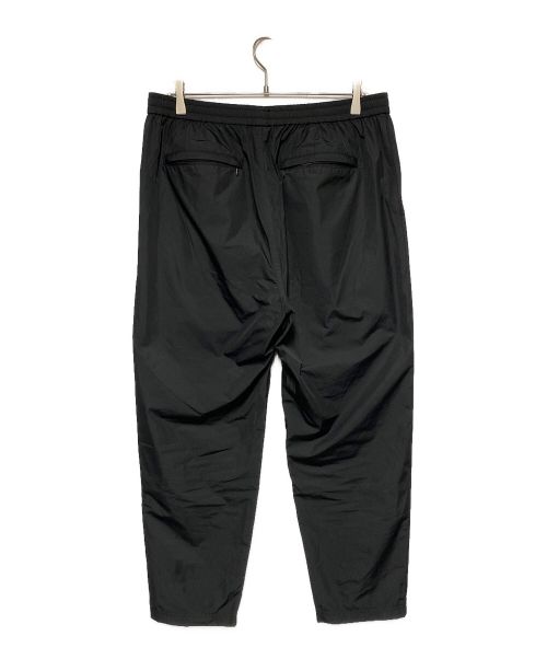 Champion（チャンピオン）Champion (チャンピオン) ビッグロゴナイロンパンツ ブラック サイズ:Lの古着・服飾アイテム