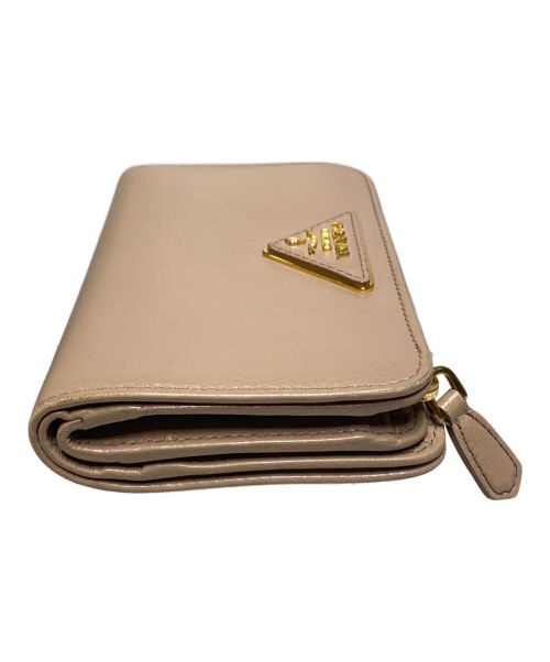 PRADA（プラダ）PRADA (プラダ) サフィアーノレザーウォレット / 2つ折り財布 ベージュの古着・服飾アイテム