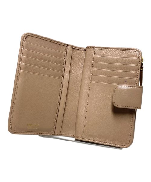 PRADA（プラダ）PRADA (プラダ) サフィアーノレザーウォレット / 2つ折り財布 ベージュの古着・服飾アイテム