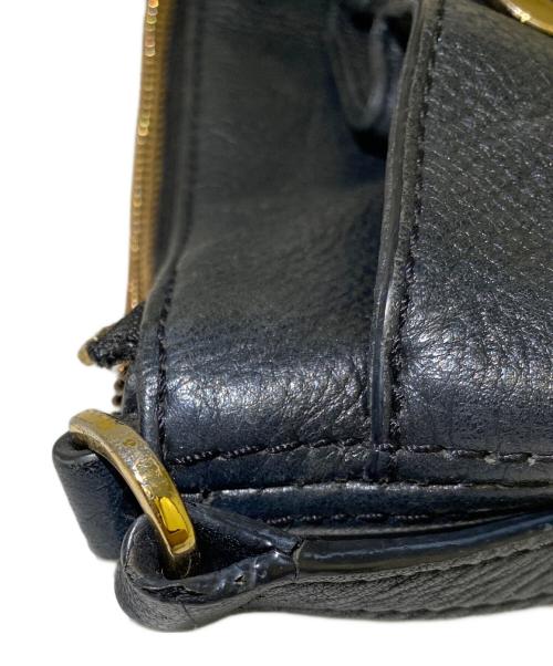 MICHAEL KORS（マイケル・コース）MICHAEL KORS (マイケル・コース) タッセル付きショルダーバッグ ブラックの古着・服飾アイテム