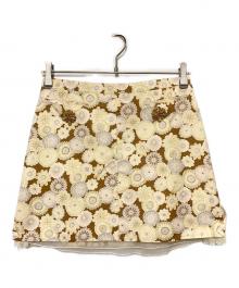 LOUIS VUITTON（ルイ ヴィトン）の古着「フラワープリントビジューミニスカート」｜ベージュ