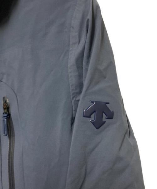 DESCENTE ALLTERRAIN（デザイント オルテライン）DESCENTE ALLTERRAIN (デザイント オルテライン) HARD SHELL JACKE / マウンテンパーカー ブルー サイズ:Mの古着・服飾アイテム