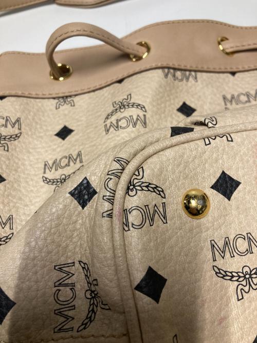 MCM（エムシーエム）MCM (エムシーエム) 巾着レザーショルダーバッグ ベージュの古着・服飾アイテム