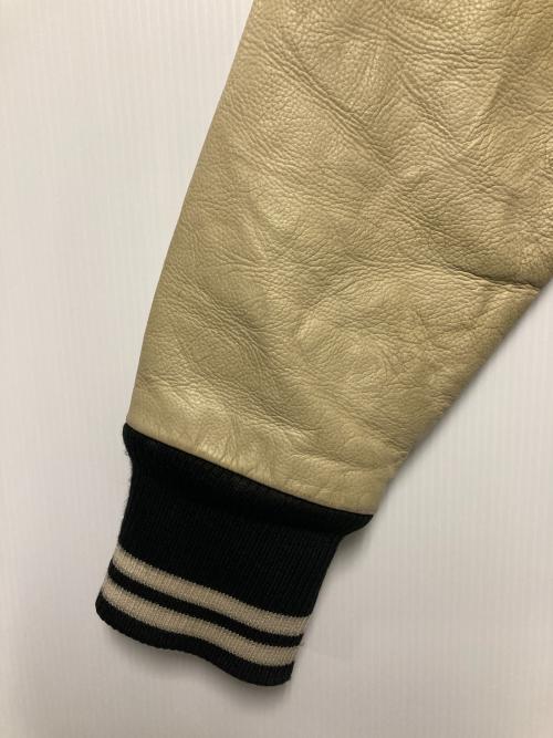 REEBOK（リーボック）REEBOK (リーボック) RAIDERS スタジャン ホワイト×ブラック サイズ:Mの古着・服飾アイテム