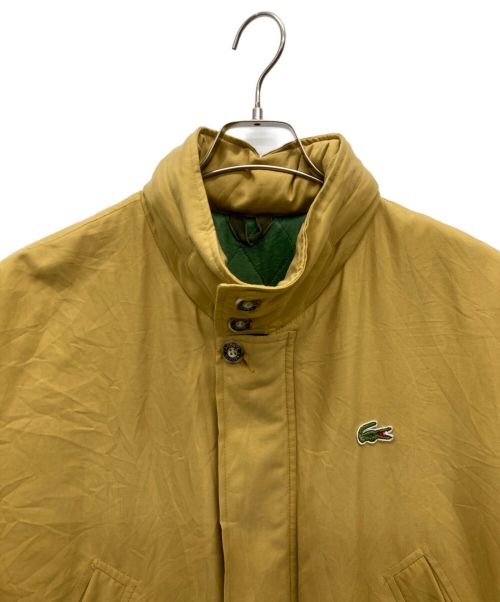 LACOSTE（ラコステ）LACOSTE (ラコステ) ヴィンテージハイネックコート イエロー×グリーン サイズ:SIZE 5の古着・服飾アイテム