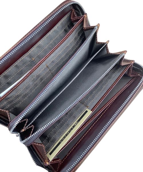 zonal（ゾナール）zonal (ゾナール) ラウンドファスナー長財布 ブラウンの古着・服飾アイテム