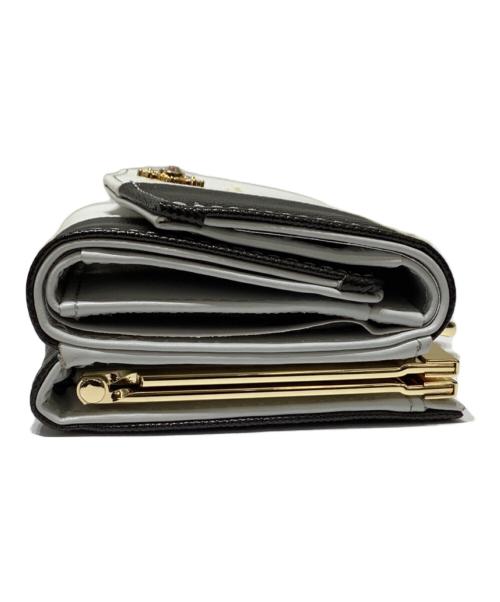 Samantha Thavasa PETIT CHOICE（サマンサタバサプチチョイス）Samantha Thavasa PETIT CHOICE (サマンサタバサプチチョイス) センターモチーフトリコロールカラー折財布 ブラック×ホワイトの古着・服飾アイテム