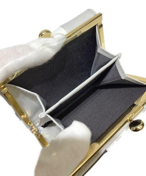 Samantha Thavasa PETIT CHOICE（サマンサタバサプチチョイス）Samantha Thavasa PETIT CHOICE (サマンサタバサプチチョイス) センターモチーフトリコロールカラー折財布 ブラック×ホワイトの古着・服飾アイテム