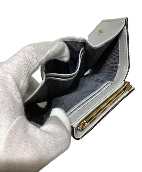 Samantha Thavasa PETIT CHOICE（サマンサタバサプチチョイス）Samantha Thavasa PETIT CHOICE (サマンサタバサプチチョイス) センターモチーフトリコロールカラー折財布 ブラック×ホワイトの古着・服飾アイテム