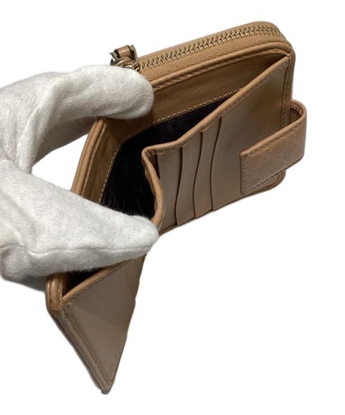 GUCCI（グッチ）GUCCI (グッチ) 2つ折り財布 ベージュの古着・服飾アイテム