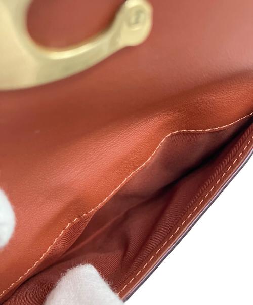 COACH（コーチ）COACH (コーチ) 2つ折り財布 ブラウンの古着・服飾アイテム