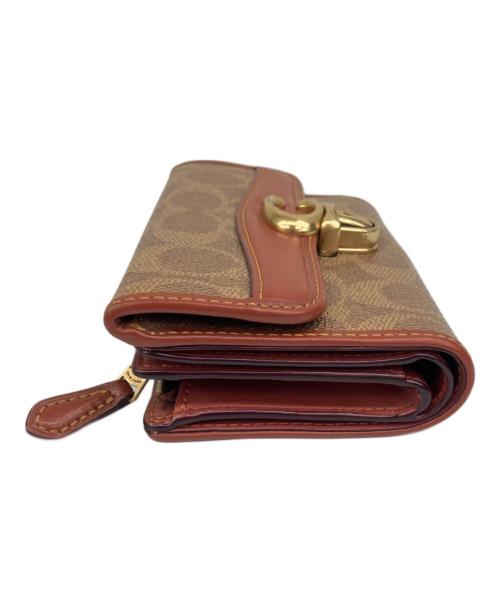 COACH（コーチ）COACH (コーチ) 2つ折り財布 ブラウンの古着・服飾アイテム