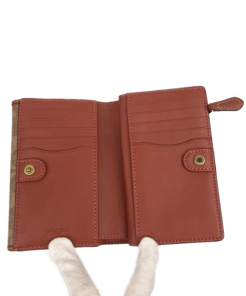COACH（コーチ）COACH (コーチ) 2つ折り財布 ブラウンの古着・服飾アイテム