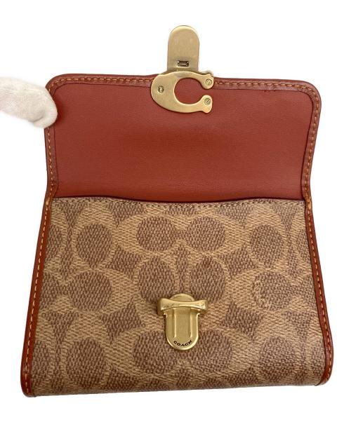 COACH（コーチ）COACH (コーチ) 2つ折り財布 ブラウンの古着・服飾アイテム