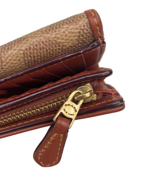 COACH（コーチ）COACH (コーチ) 2つ折り財布 ブラウンの古着・服飾アイテム