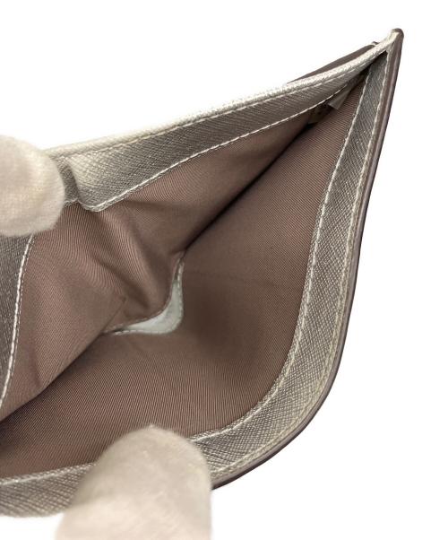 TORY BURCH（トリーバーチ）TORY BURCH (トリーバーチ) ミニ財布 シルバー色の古着・服飾アイテム