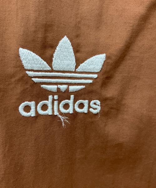 adidas（アディダス）adidas (アディダス) ウーブン ファイヤーバード トラックトラップ ブラウン サイズ:Ｓの古着・服飾アイテム